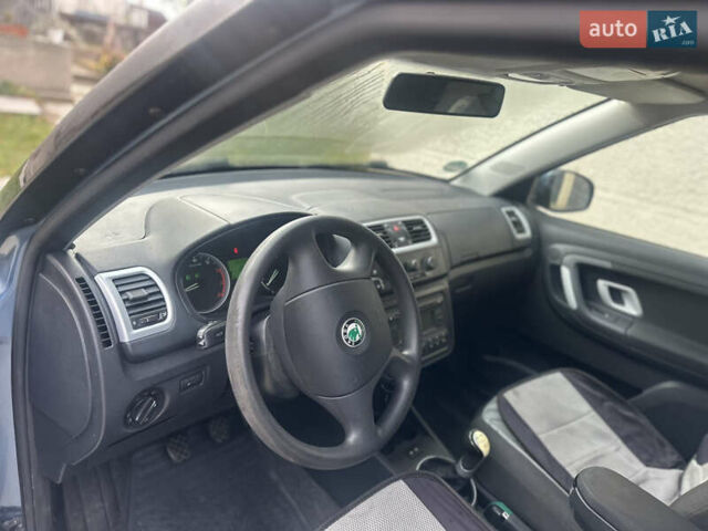 Синий Шкода Фабия, объемом двигателя 1.6 л и пробегом 205 тыс. км за 5150 $, фото 29 на Automoto.ua