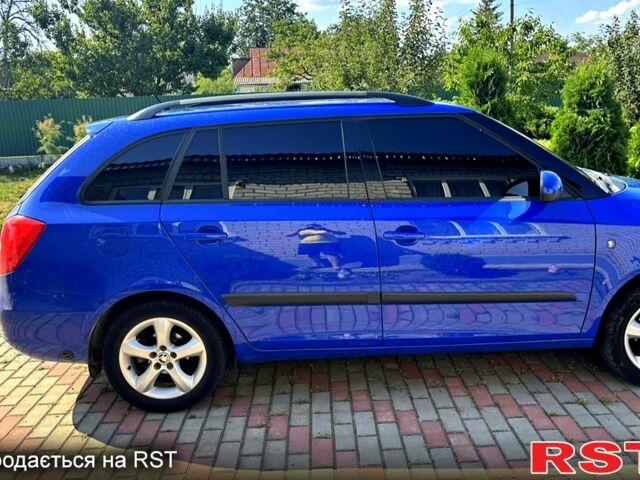 Синий Шкода Фабия, объемом двигателя 1.6 л и пробегом 250 тыс. км за 5900 $, фото 3 на Automoto.ua