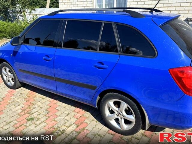 Синий Шкода Фабия, объемом двигателя 1.6 л и пробегом 250 тыс. км за 5900 $, фото 1 на Automoto.ua