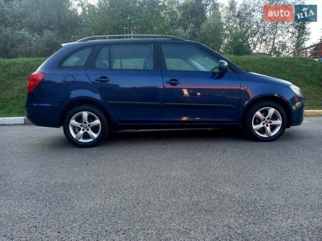 Синий Шкода Фабия, объемом двигателя 1.6 л и пробегом 230 тыс. км за 7550 $, фото 13 на Automoto.ua