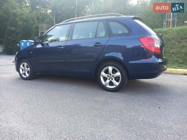 Синий Шкода Фабия, объемом двигателя 1.6 л и пробегом 230 тыс. км за 7550 $, фото 29 на Automoto.ua