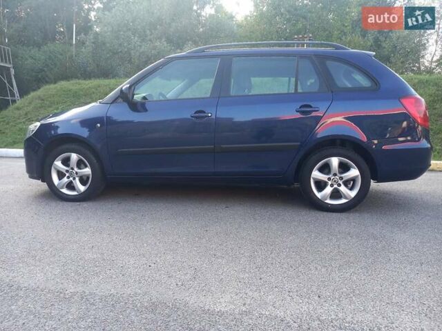 Синий Шкода Фабия, объемом двигателя 1.6 л и пробегом 230 тыс. км за 7550 $, фото 25 на Automoto.ua