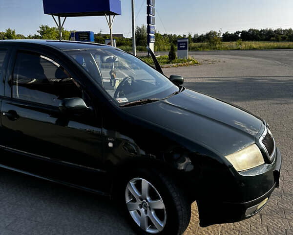 Зеленый Шкода Фабия, объемом двигателя 1.4 л и пробегом 262 тыс. км за 2350 $, фото 3 на Automoto.ua