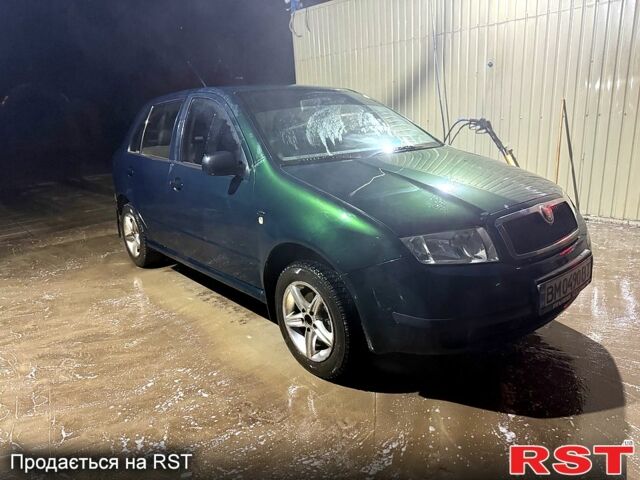 Зеленый Шкода Фабия, объемом двигателя 1.4 л и пробегом 100 тыс. км за 3500 $, фото 1 на Automoto.ua