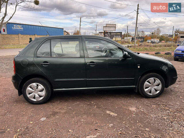 Зеленый Шкода Фабия, объемом двигателя 1.39 л и пробегом 297 тыс. км за 2450 $, фото 5 на Automoto.ua