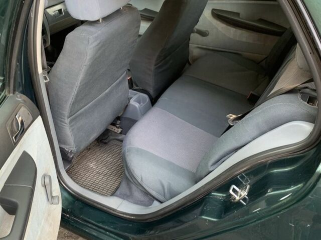 Зеленый Шкода Фабия, объемом двигателя 1.4 л и пробегом 261 тыс. км за 3500 $, фото 2 на Automoto.ua