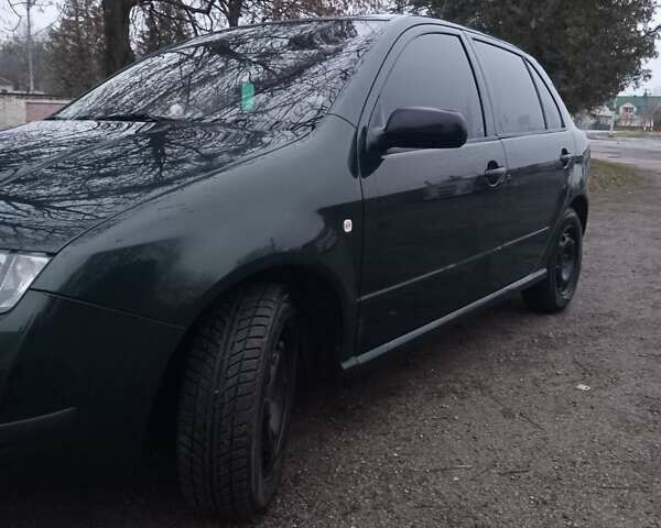 Зеленый Шкода Фабия, объемом двигателя 1.2 л и пробегом 185 тыс. км за 3250 $, фото 6 на Automoto.ua