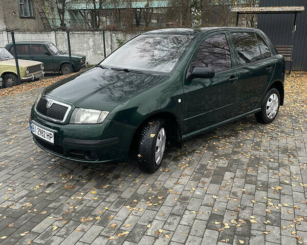 Зеленый Шкода Фабия, объемом двигателя 1.2 л и пробегом 193 тыс. км за 2700 $, фото 1 на Automoto.ua