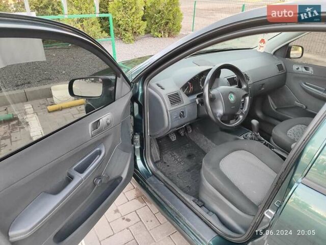 Зеленый Шкода Фабия, объемом двигателя 1.2 л и пробегом 252 тыс. км за 3300 $, фото 2 на Automoto.ua