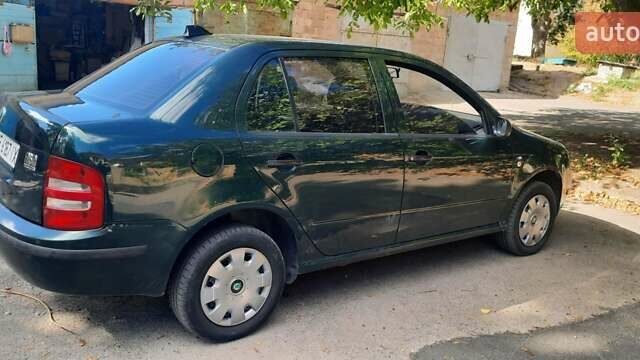 Шкода Фабия 2003 в Желтых Водах на Automoto.ua Зеленый Шкода Фабия, объемом двигателя 1.4 л и пробегом 233 тыс. км за 3350 $, фото 8 на Automoto.ua