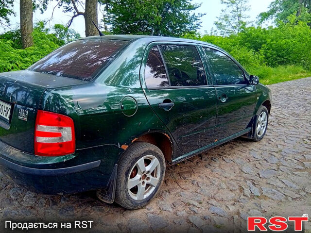 Зеленый Шкода Фабия, объемом двигателя 1.2 л и пробегом 300 тыс. км за 2100 $, фото 3 на Automoto.ua
