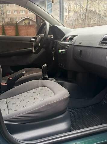 Зелений Шкода Фабія, об'ємом двигуна 1.39 л та пробігом 240 тис. км за 3399 $, фото 14 на Automoto.ua