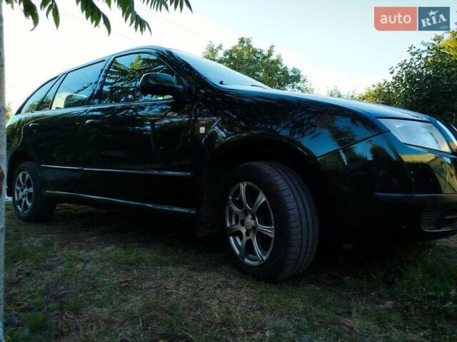 Зеленый Шкода Фабия, объемом двигателя 1.4 л и пробегом 280 тыс. км за 3400 $, фото 6 на Automoto.ua