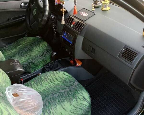 Зелений Шкода Фабія, об'ємом двигуна 1.4 л та пробігом 290 тис. км за 2900 $, фото 4 на Automoto.ua