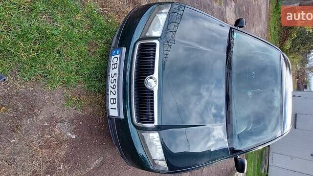 Зеленый Шкода Фабия, объемом двигателя 1.2 л и пробегом 240 тыс. км за 2850 $, фото 1 на Automoto.ua