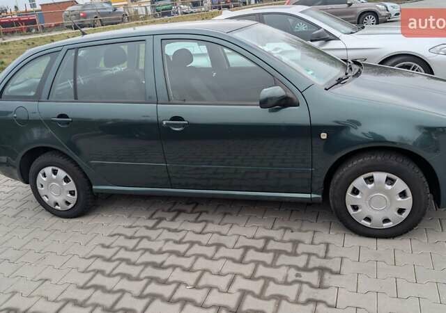 Зеленый Шкода Фабия, объемом двигателя 1.39 л и пробегом 230 тыс. км за 3800 $, фото 5 на Automoto.ua