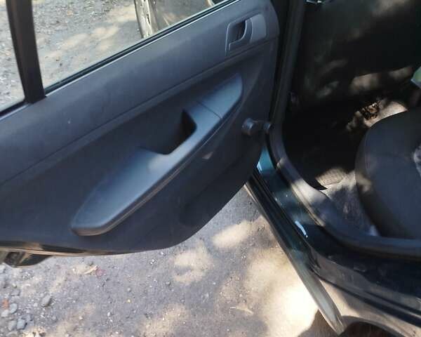 Зеленый Шкода Фабия, объемом двигателя 1.39 л и пробегом 179 тыс. км за 5000 $, фото 3 на Automoto.ua