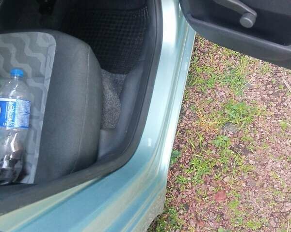 Зеленый Шкода Фабия, объемом двигателя 1.2 л и пробегом 152 тыс. км за 4600 $, фото 14 на Automoto.ua