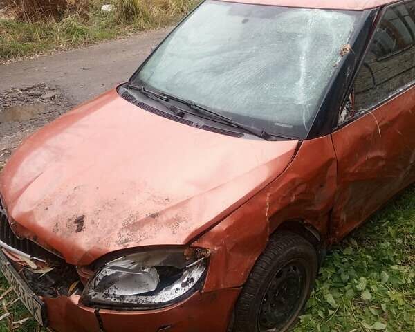 Оранжевый Шкода Фабия, объемом двигателя 1.2 л и пробегом 366 тыс. км за 1600 $, фото 1 на Automoto.ua