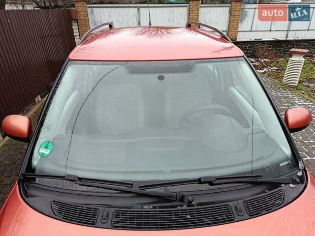 Помаранчевий Шкода Фабія, об'ємом двигуна 1.39 л та пробігом 234 тис. км за 5750 $, фото 2 на Automoto.ua