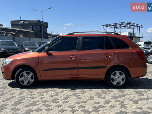 Помаранчевий Шкода Фабія, об'ємом двигуна 1.2 л та пробігом 184 тис. км за 5400 $, фото 3 на Automoto.ua