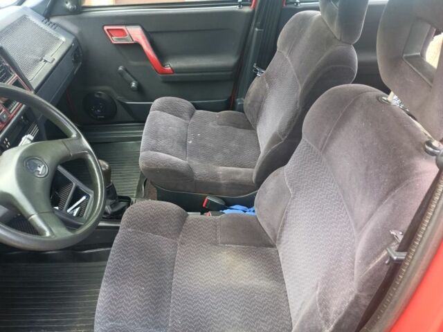 Красный Шкода Фаворит, объемом двигателя 1.3 л и пробегом 235 тыс. км за 1400 $, фото 5 на Automoto.ua