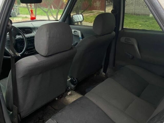 Белый Шкода Фелиция, объемом двигателя 1.3 л и пробегом 74 тыс. км за 1319 $, фото 5 на Automoto.ua