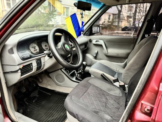 Красный Шкода Фелиция, объемом двигателя 1.6 л и пробегом 300 тыс. км за 1000 $, фото 7 на Automoto.ua