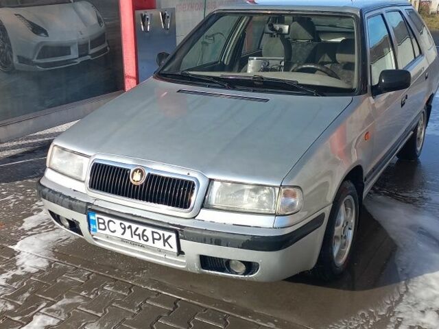 Сірий Шкода Феліція, об'ємом двигуна 1.3 л та пробігом 295 тис. км за 1903 $, фото 7 на Automoto.ua