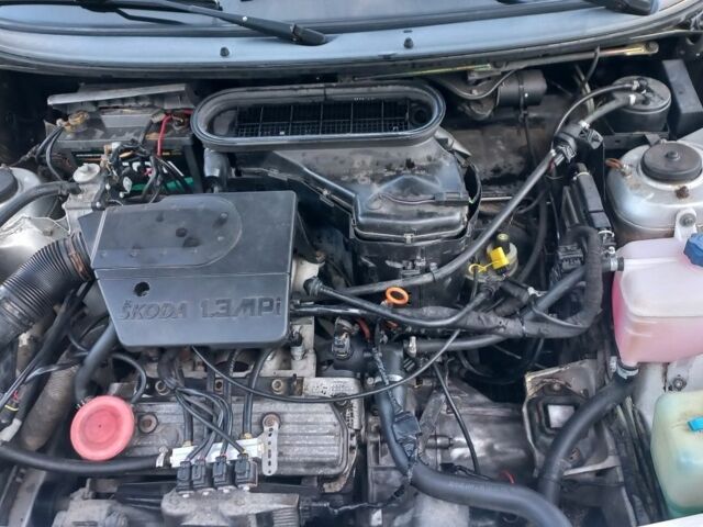 Сірий Шкода Феліція, об'ємом двигуна 1.3 л та пробігом 295 тис. км за 1903 $, фото 4 на Automoto.ua