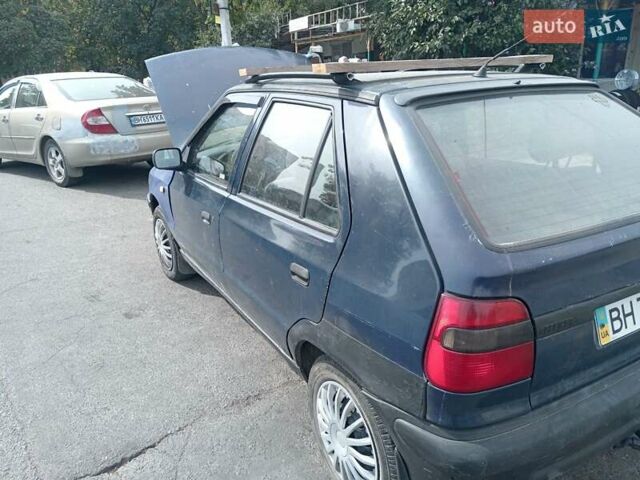 Синий Шкода Фелиция, объемом двигателя 1.3 л и пробегом 250 тыс. км за 900 $, фото 5 на Automoto.ua