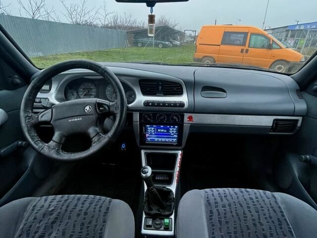 Синий Шкода Фелиция, объемом двигателя 1.6 л и пробегом 195 тыс. км за 2100 $, фото 7 на Automoto.ua