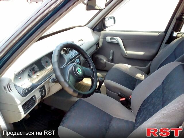 Зелений Шкода Феліція, об'ємом двигуна 1.3 л та пробігом 244 тис. км за 1500 $, фото 3 на Automoto.ua