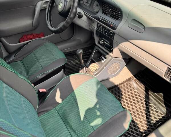 Зеленый Шкода Фелиция, объемом двигателя 1.3 л и пробегом 265 тыс. км за 1400 $, фото 4 на Automoto.ua