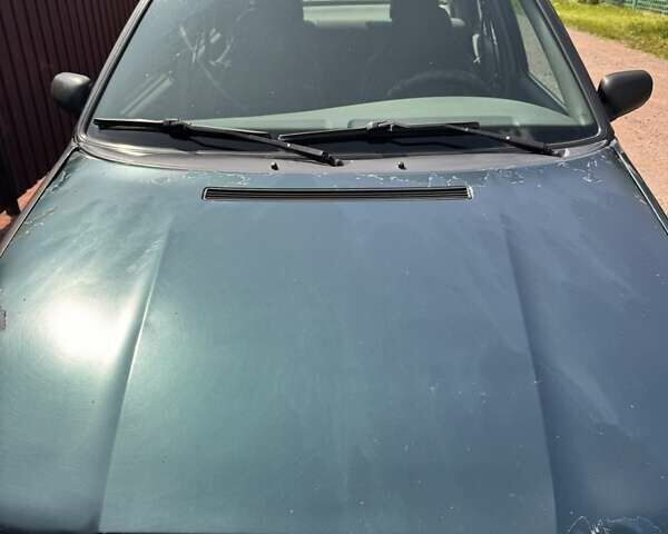 Зеленый Шкода Фелиция, объемом двигателя 1.3 л и пробегом 265 тыс. км за 1400 $, фото 1 на Automoto.ua