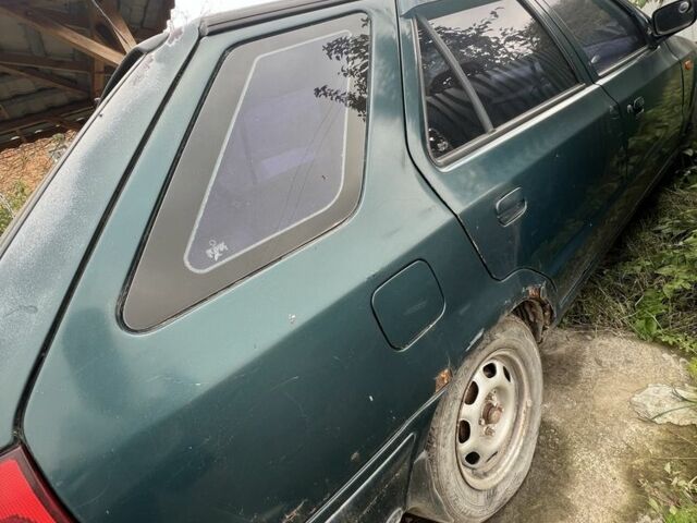 Зелений Шкода Феліція, об'ємом двигуна 1.3 л та пробігом 200 тис. км за 999 $, фото 4 на Automoto.ua