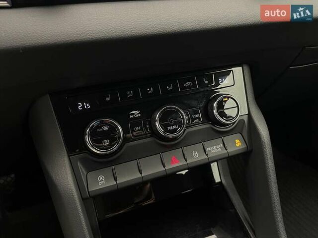 Белый Шкода Karoq, объемом двигателя 1.5 л и пробегом 90 тыс. км за 21621 $, фото 18 на Automoto.ua