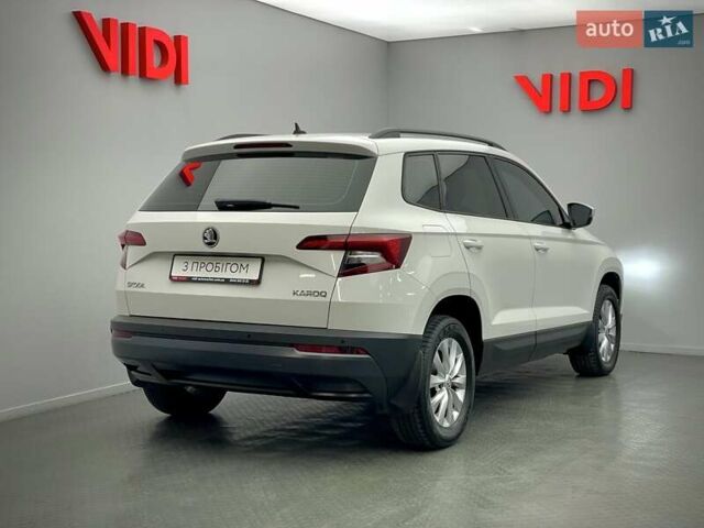 Белый Шкода Karoq, объемом двигателя 1.5 л и пробегом 116 тыс. км за 20872 $, фото 1 на Automoto.ua