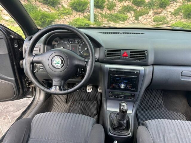 Черный Шкода Kodiaq, объемом двигателя 1.8 л и пробегом 312 тыс. км за 6600 $, фото 10 на Automoto.ua