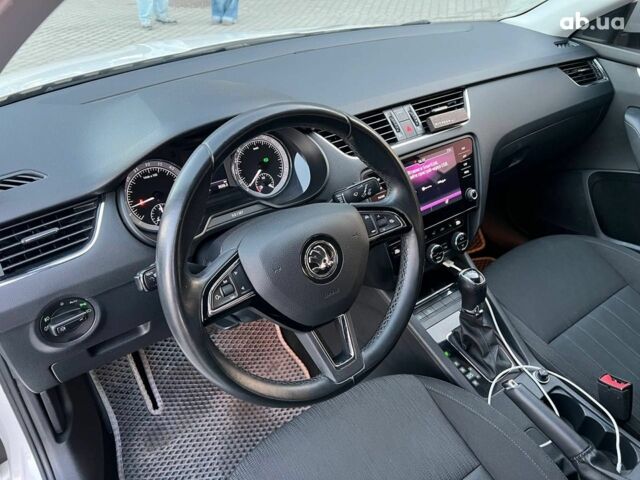 Белый Шкода Octavia A7, объемом двигателя 1.6 л и пробегом 302 тыс. км за 14290 $, фото 16 на Automoto.ua