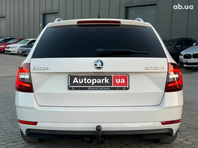 Белый Шкода Octavia A7, объемом двигателя 1.6 л и пробегом 302 тыс. км за 14290 $, фото 6 на Automoto.ua