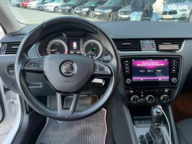 Белый Шкода Octavia A7, объемом двигателя 1.6 л и пробегом 302 тыс. км за 14290 $, фото 22 на Automoto.ua