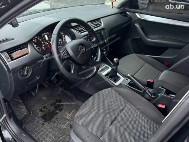 Черный Шкода Octavia A7, объемом двигателя 16 л и пробегом 298 тыс. км за 10290 $, фото 13 на Automoto.ua