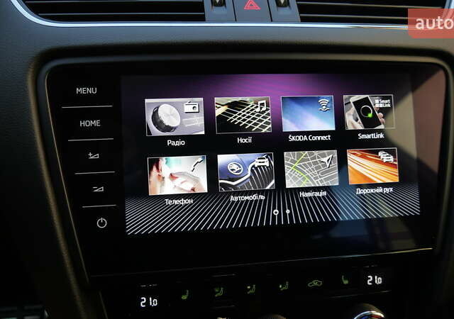 Білий Шкода Octavia Scout, об'ємом двигуна 2 л та пробігом 194 тис. км за 21400 $, фото 35 на Automoto.ua