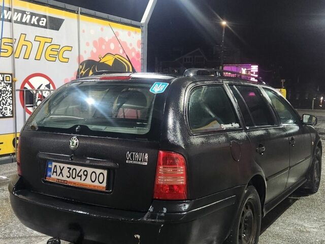 Черный Шкода Октавия Скаут, объемом двигателя 1.9 л и пробегом 400 тыс. км за 1894 $, фото 4 на Automoto.ua