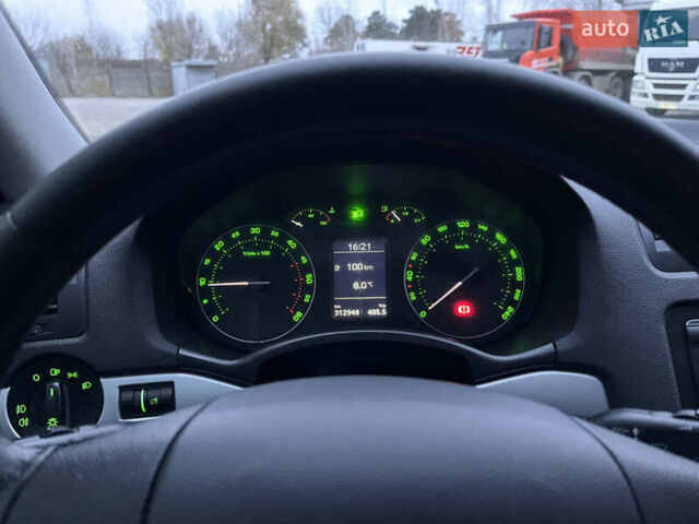 Черный Шкода Октавия Скаут, объемом двигателя 1.98 л и пробегом 312 тыс. км за 7000 $, фото 2 на Automoto.ua