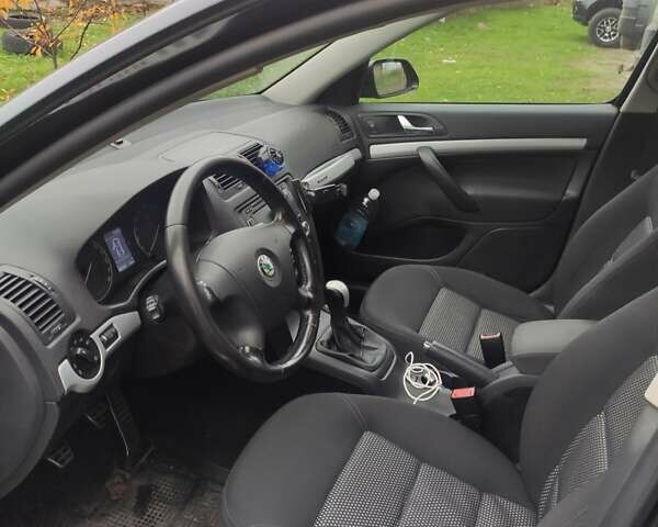 Чорний Шкода Octavia Scout, об'ємом двигуна 2 л та пробігом 202 тис. км за 8000 $, фото 2 на Automoto.ua