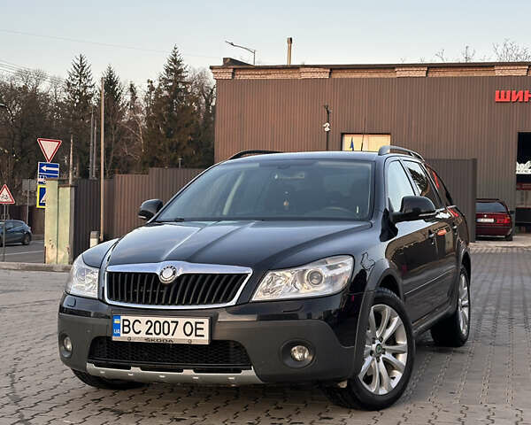 Черный Шкода Октавия Скаут, объемом двигателя 1.97 л и пробегом 210 тыс. км за 10800 $, фото 1 на Automoto.ua