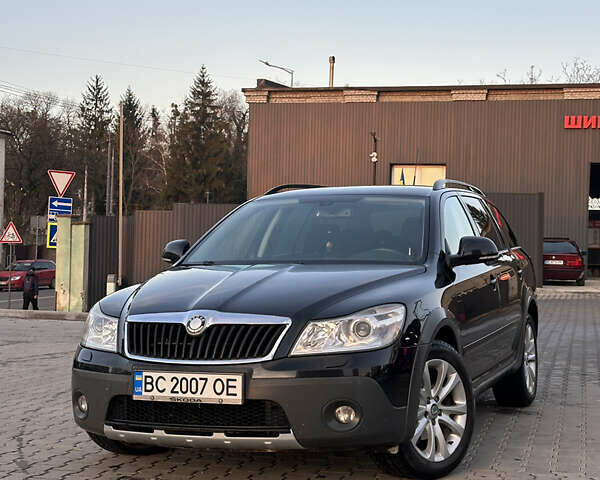 Черный Шкода Октавия Скаут, объемом двигателя 1.97 л и пробегом 210 тыс. км за 10800 $, фото 2 на Automoto.ua