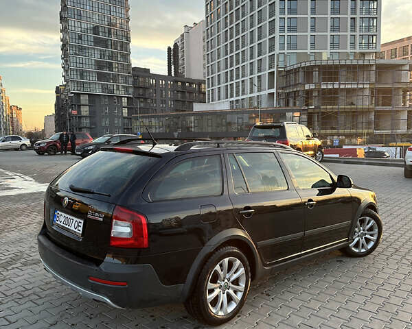 Черный Шкода Октавия Скаут, объемом двигателя 1.97 л и пробегом 210 тыс. км за 10800 $, фото 24 на Automoto.ua
